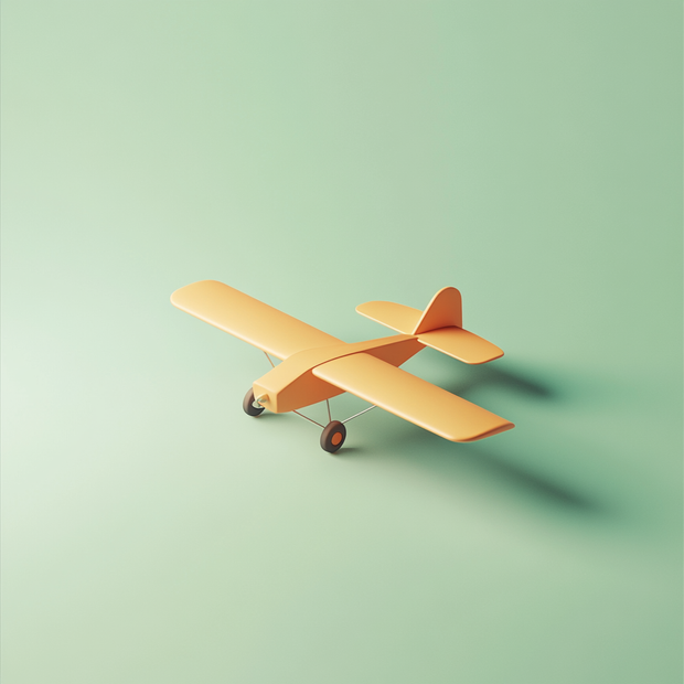 Yellow toy airplane on a light green background