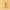 Green pen on a two-tone beige background